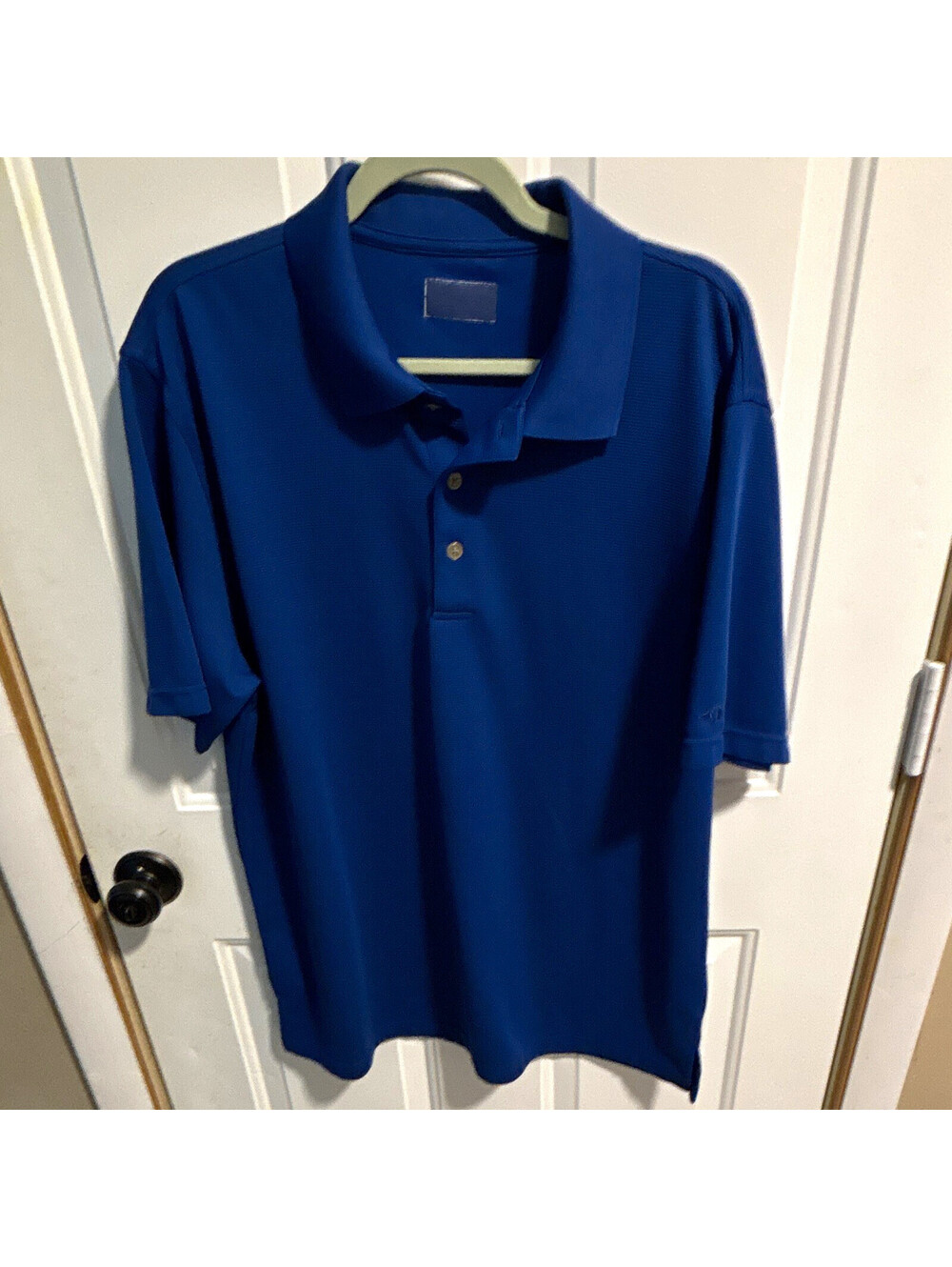 Grand Slam Men’s L Blue Solid Collared Short Sleeve Polyester Polo Shirt Logo